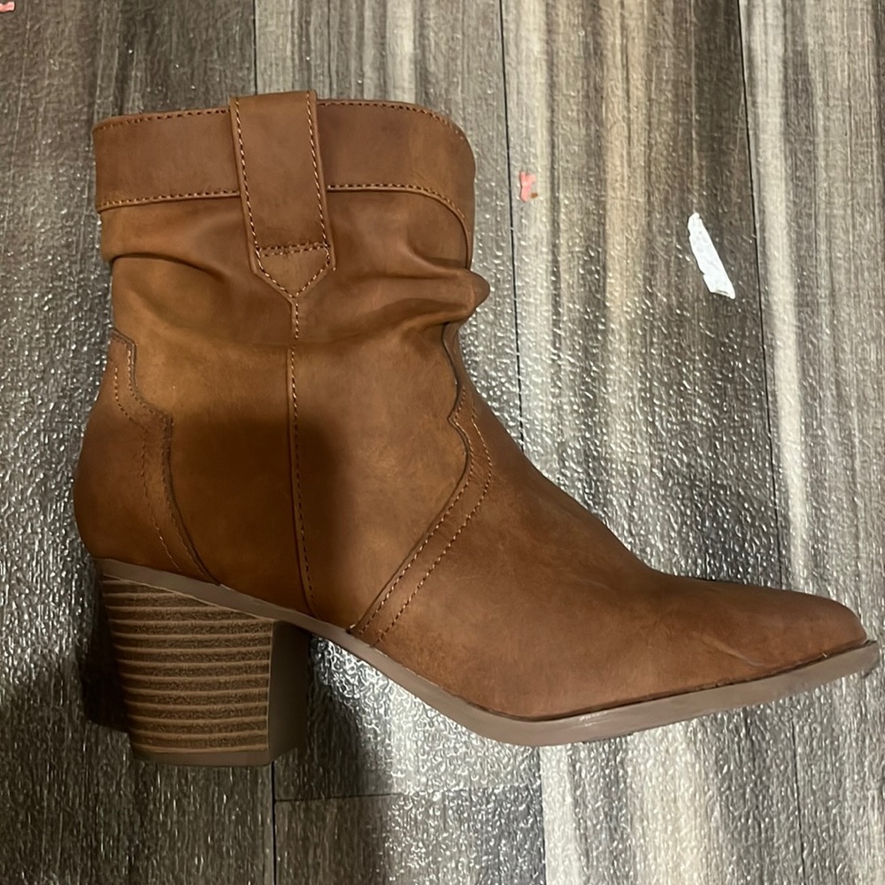 Gently used heeled boots.